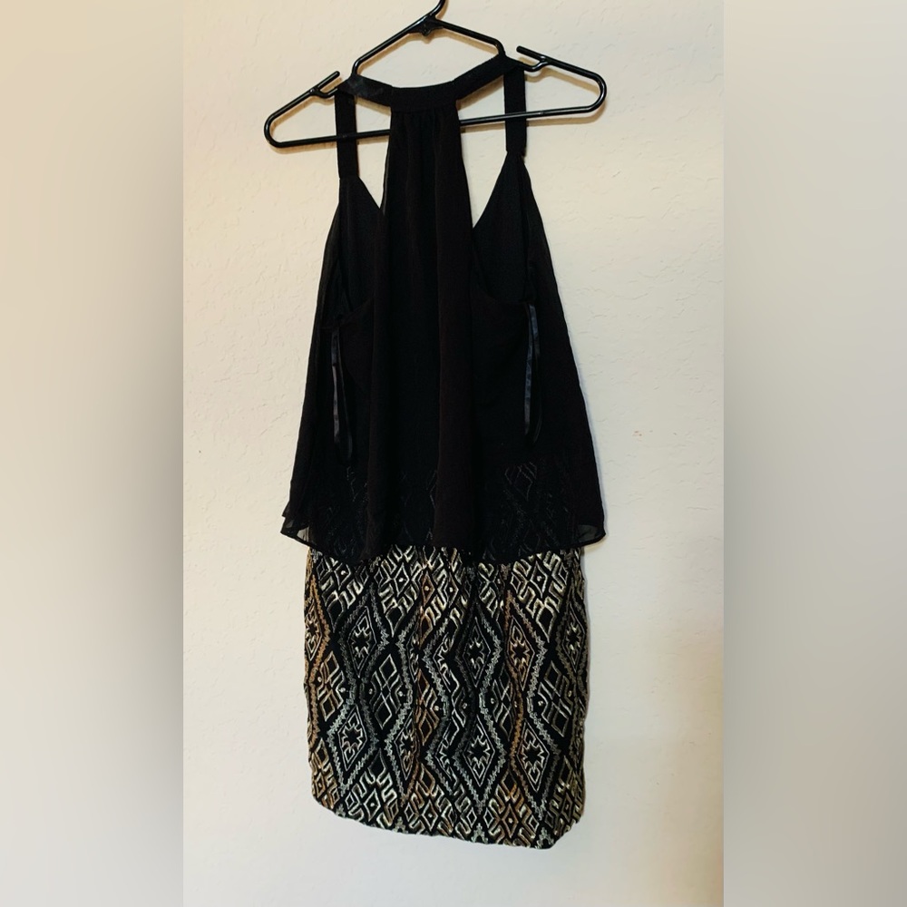Mini dress black and gold size XL great condition.
